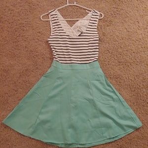 Teal dress with black and white stripes